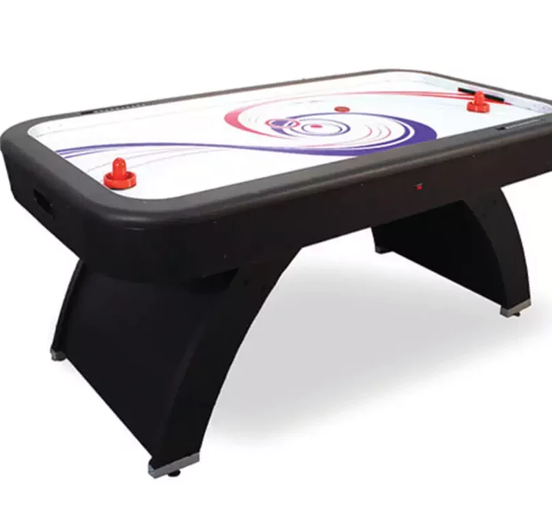 White and black air hockey table with a red and blue swirl design on the playfield.