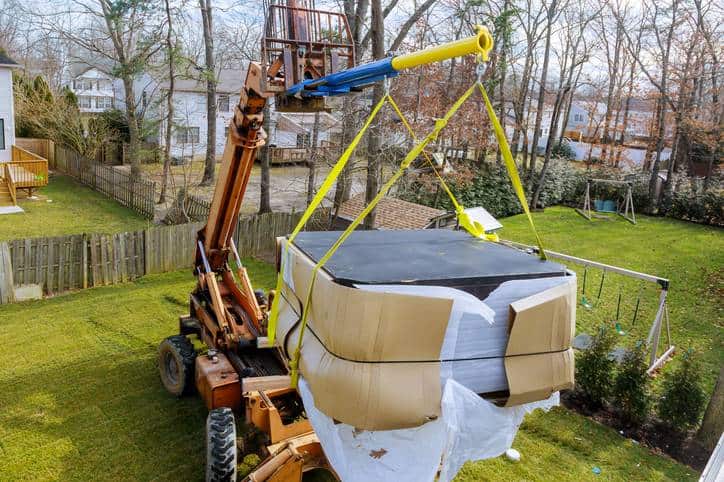 learning how to move a hot tub with a crane