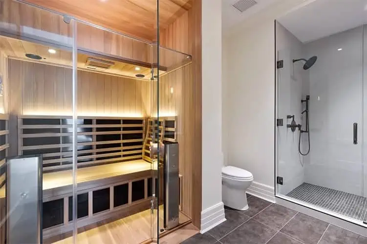 A luxurious jacuzzi infrared sauna with warm glowing lights.
