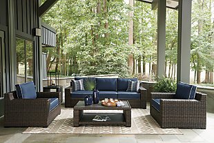 Outdoor Furniture - Take A Break Spas And Billiards Black Patio Sectional With Blue Cushions And Two Chairs Under A Covered Porch, Next To A Green Home With Small Coffee Table
