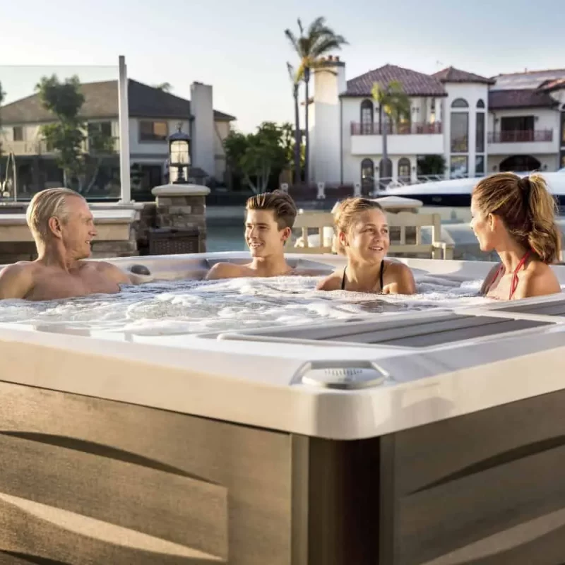 Family Enjoys Time In Their Sundance Spa Hot Tub