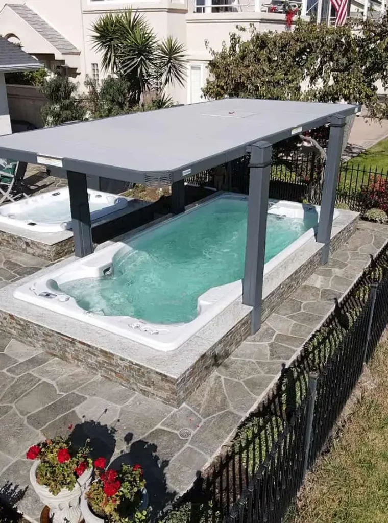 swimlife swim spa with covana auto cover in patio